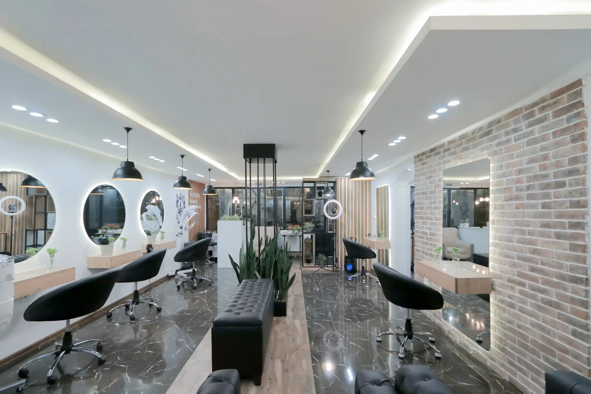 Beauty salon interior with elegant styling stations